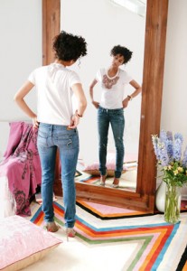 0810-woman-looking-in-mirror_at1